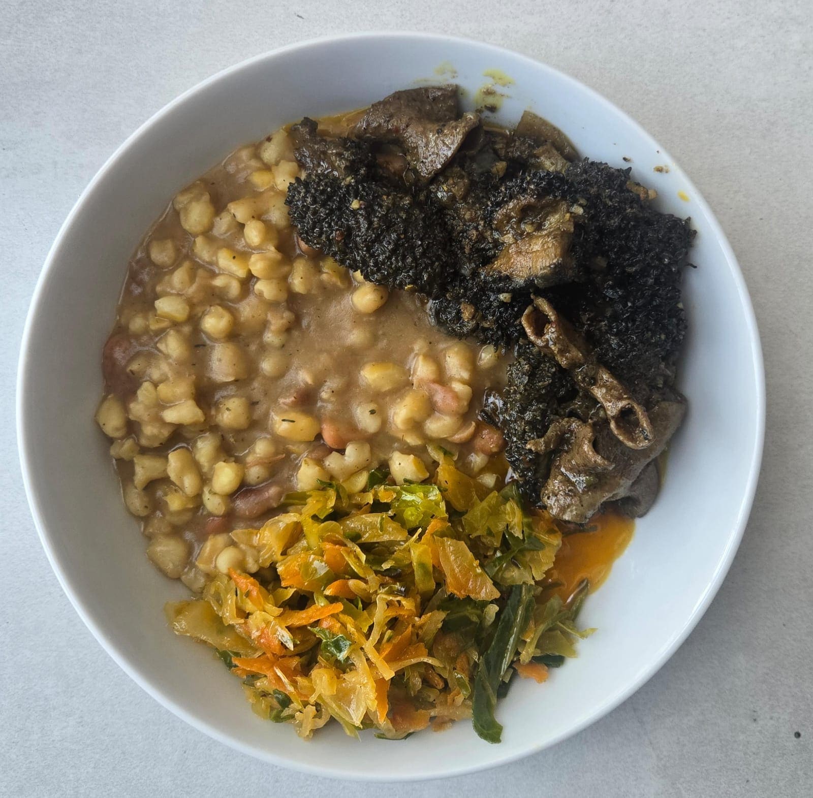 Mogodu Samp and Braised Cabbage at Heritage Bites